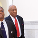 Bill Cosby (right) walks through the Montgomery County Courthouse with his publicist, Andrew Wyatt, after being found guilty on all counts in his sexual assault retrial on April 26, 2018, in Norristown, Pa.